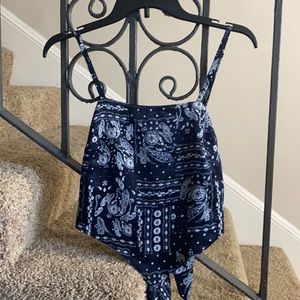 Navy blue bandana print cropped wrap blouse.